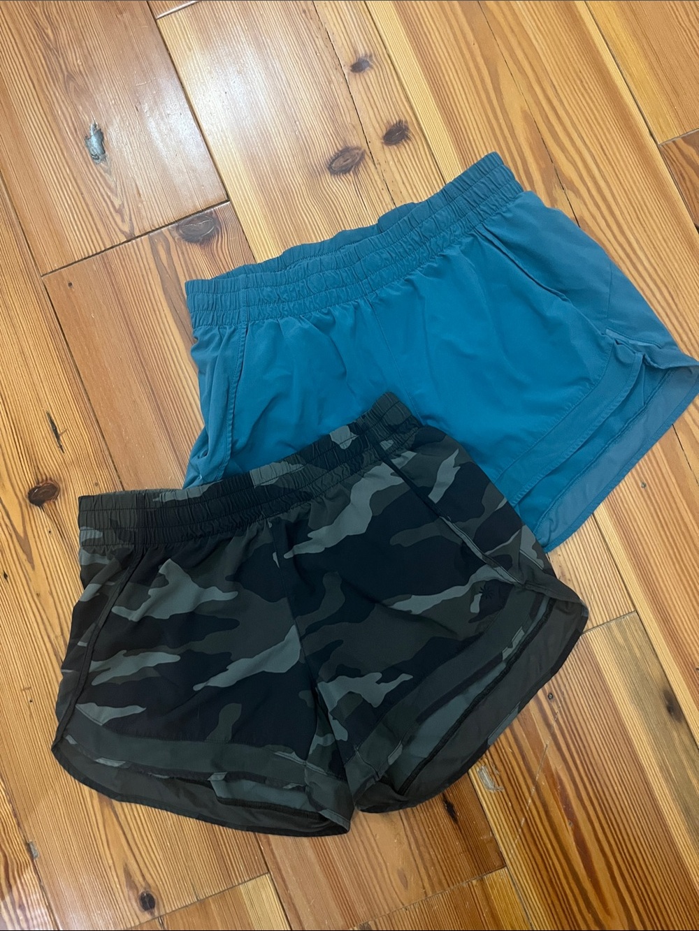 Teal and Camo Women’s athleta Mesh runner 4” shorts